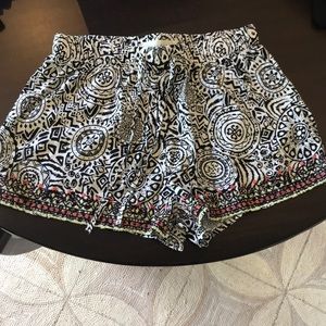 Print shorts with colorful embroidered trim size medium